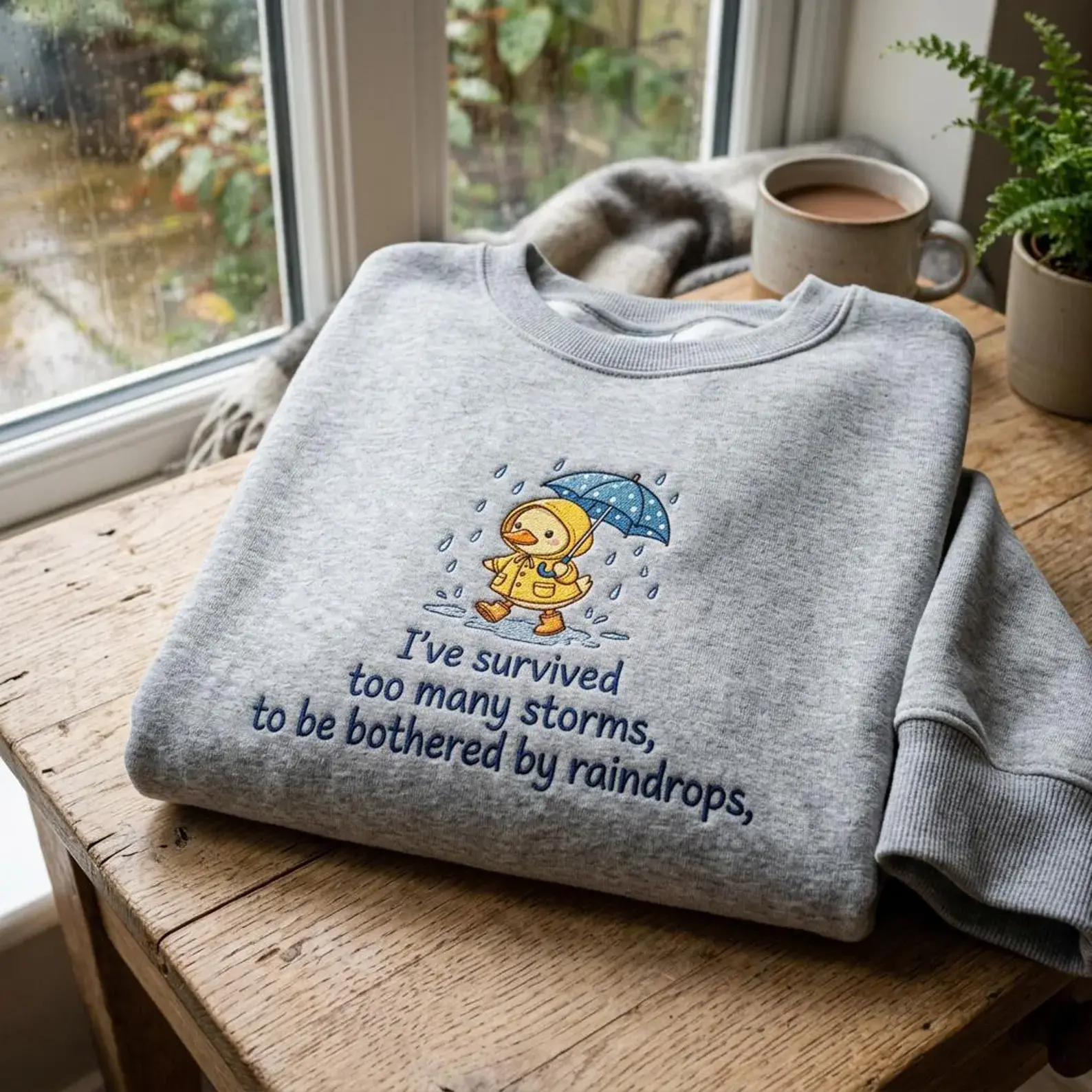 Embroidered Duck Raincoat Sweatshirt – Motivational Storm Quote Apparel